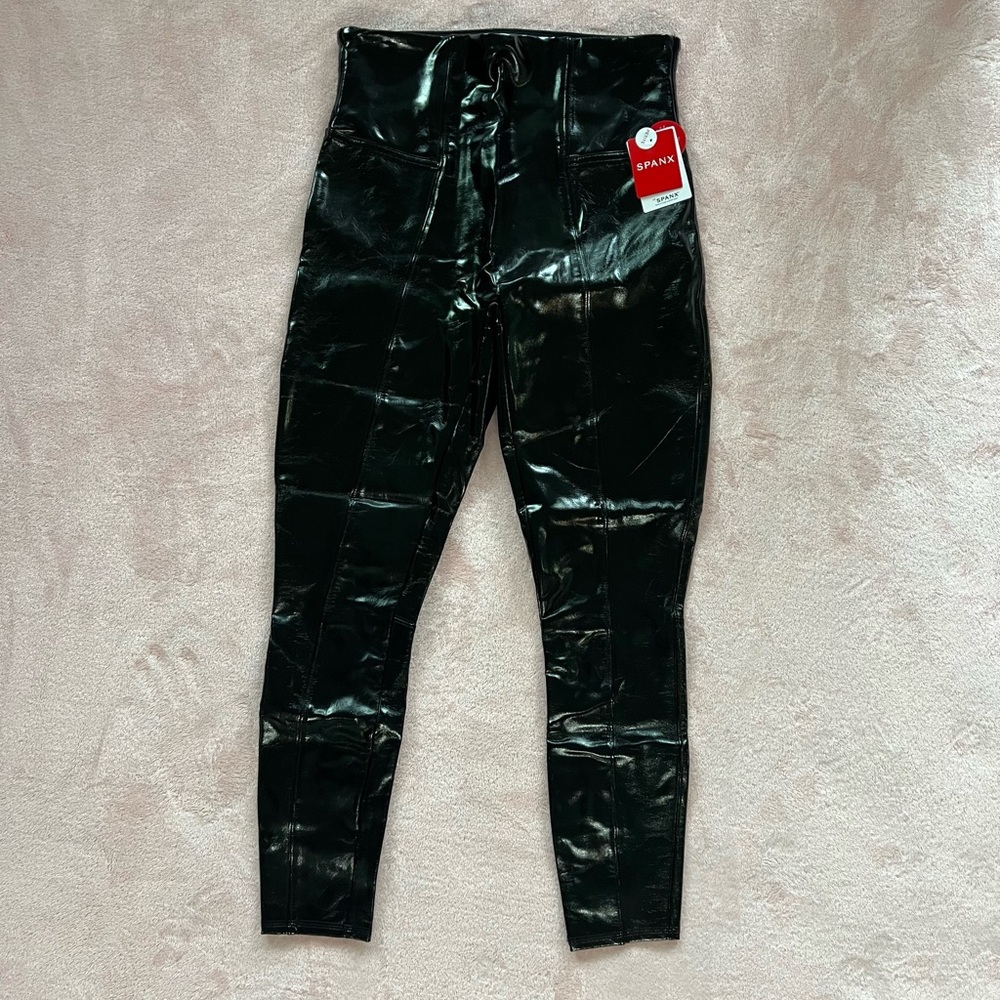 Spanx 
Classic black faux patent leather leggings